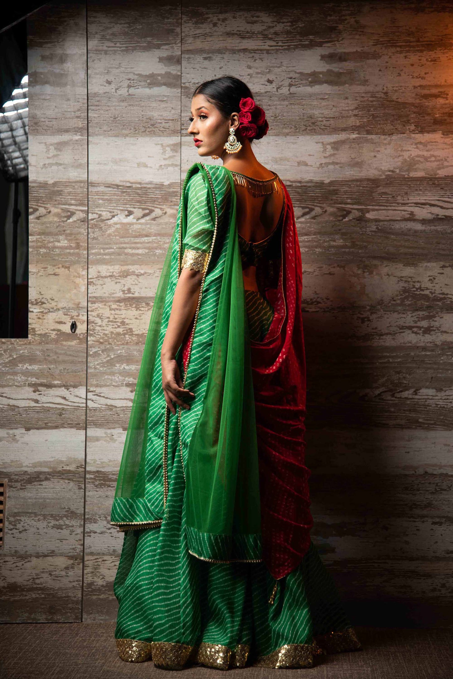 A LA MODE HERITAGE'S EMERALD FLAT LEHENGA WITH BLOUSE LEHERIYA RED & NET DUPATTA