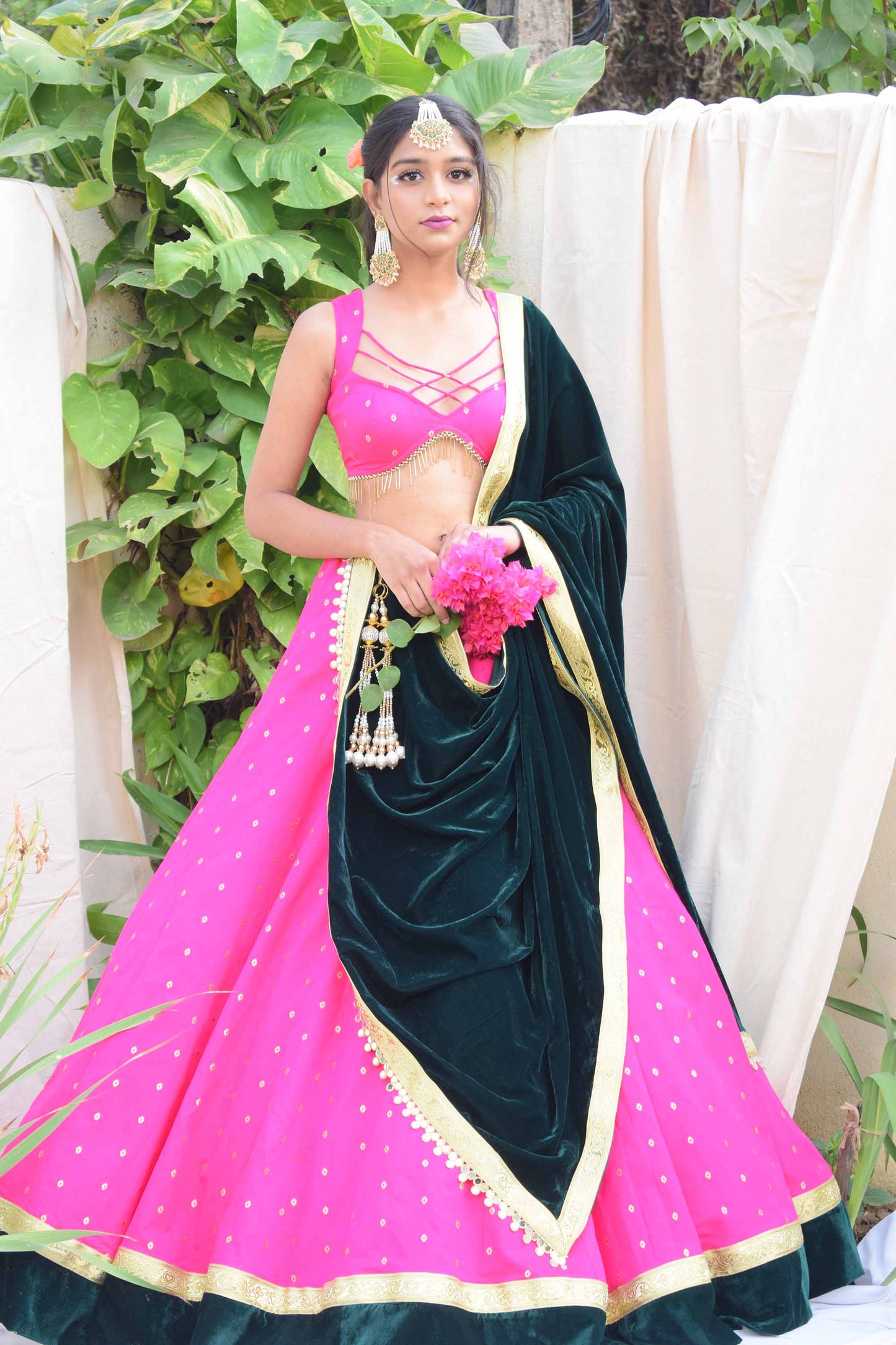A LA MODE HERITAGE'S FUCHSIA PINK LEHENGA BLOUSE WITH EMERALD GREEN VELVET DUPATTA