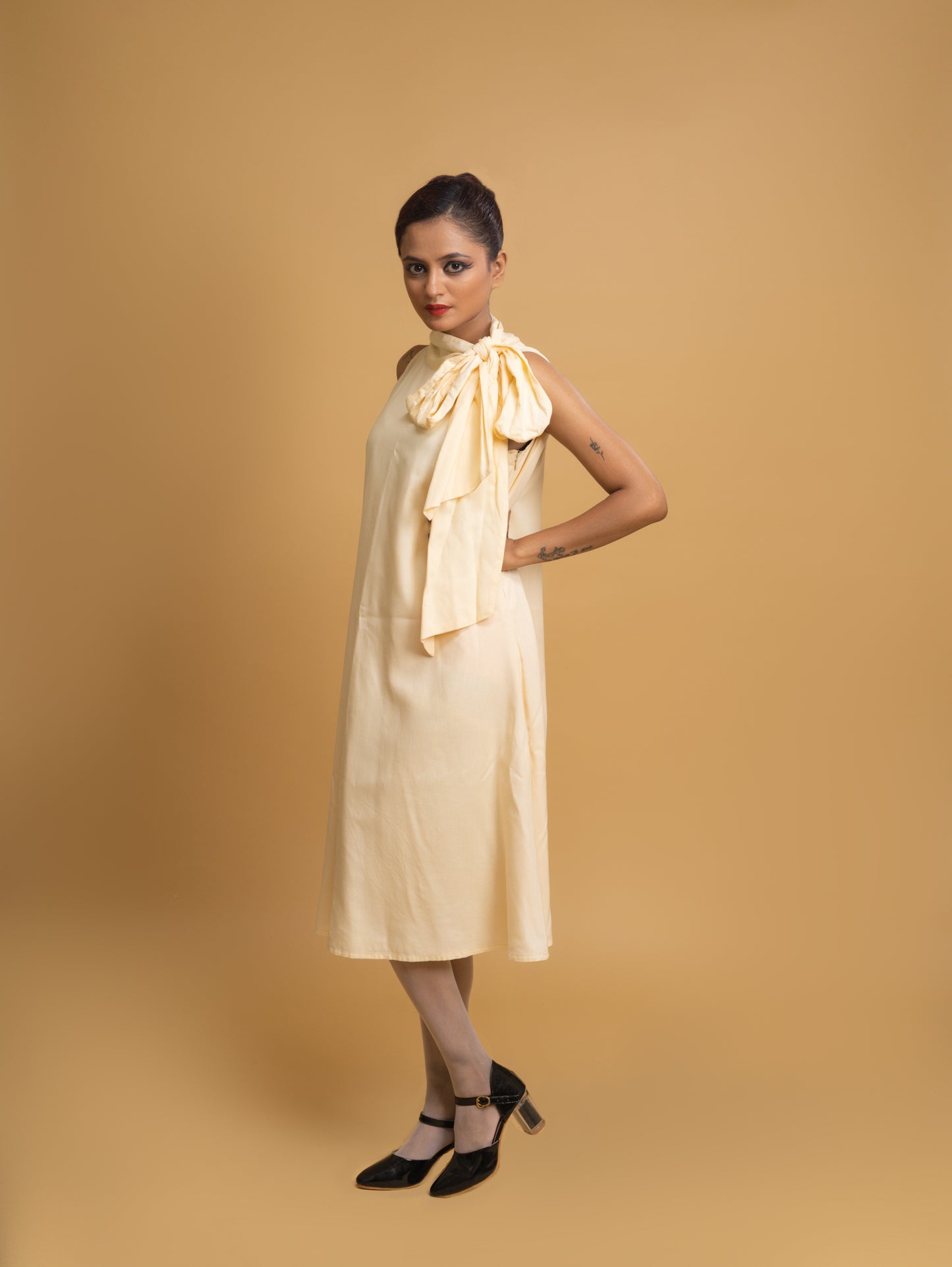 CREAM HALTER TIE KNOT DRESS