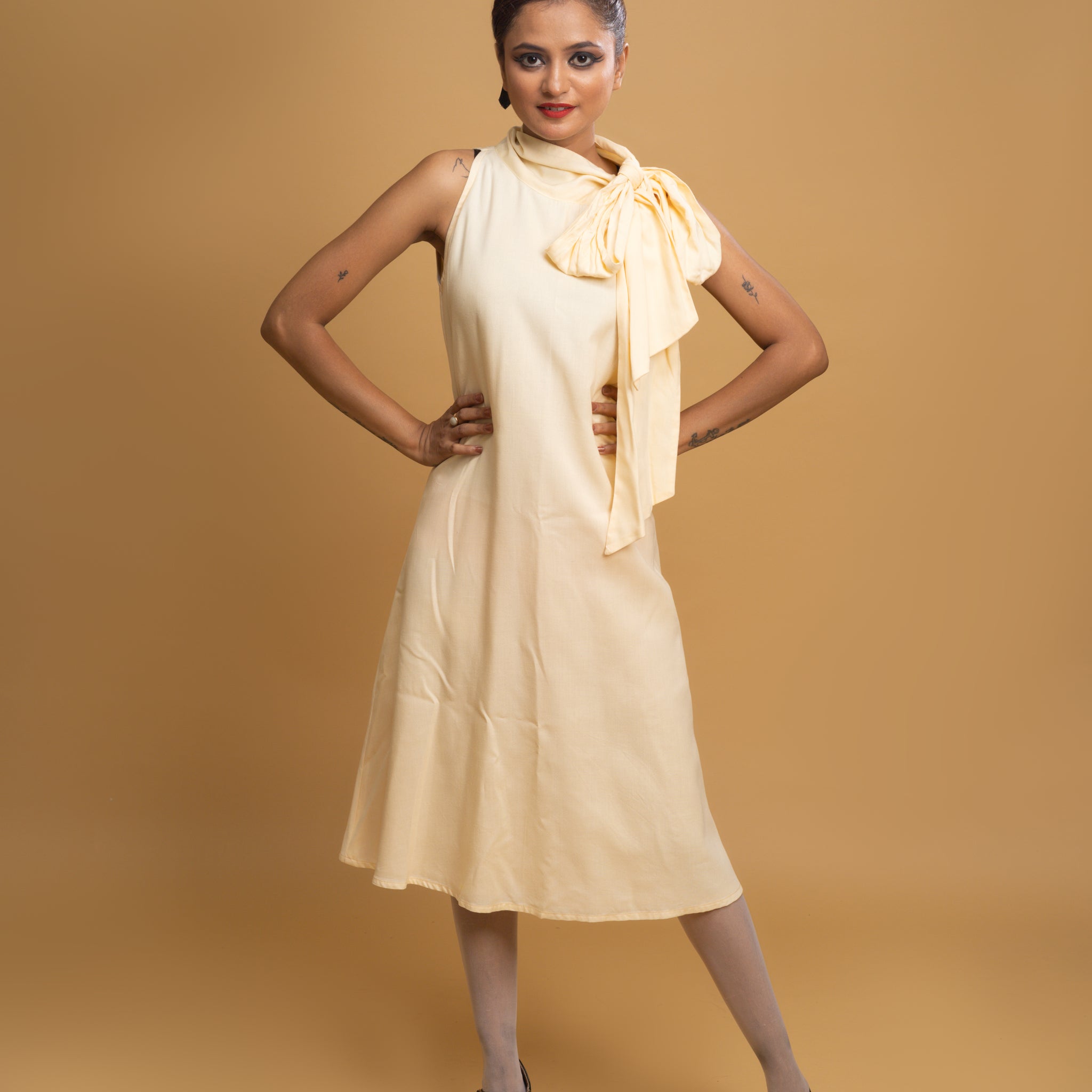 CREAM HALTER TIE KNOT DRESS