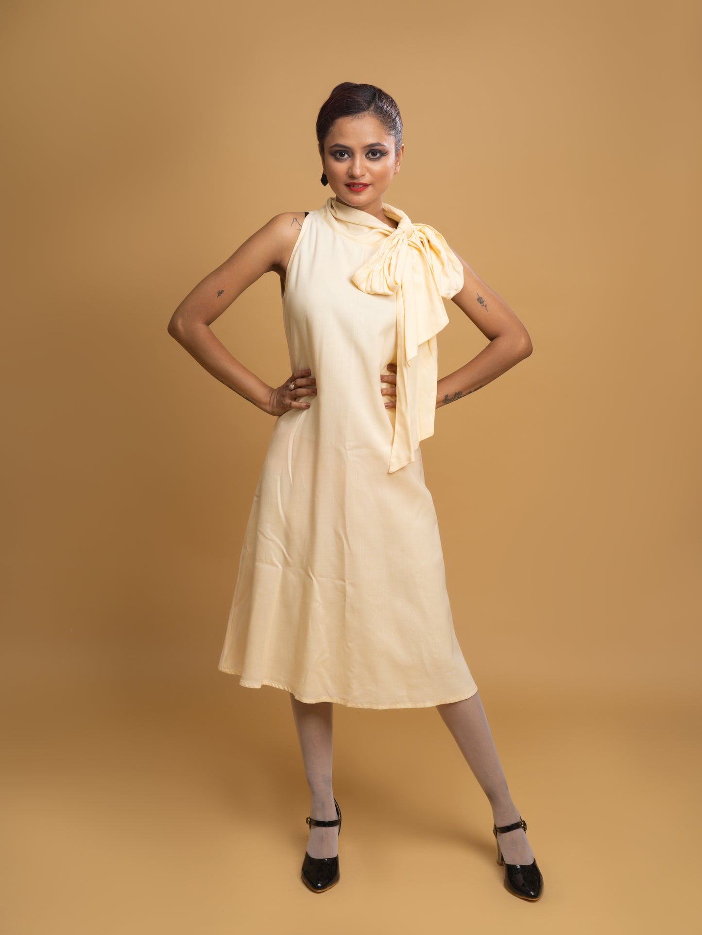 CREAM HALTER TIE KNOT DRESS