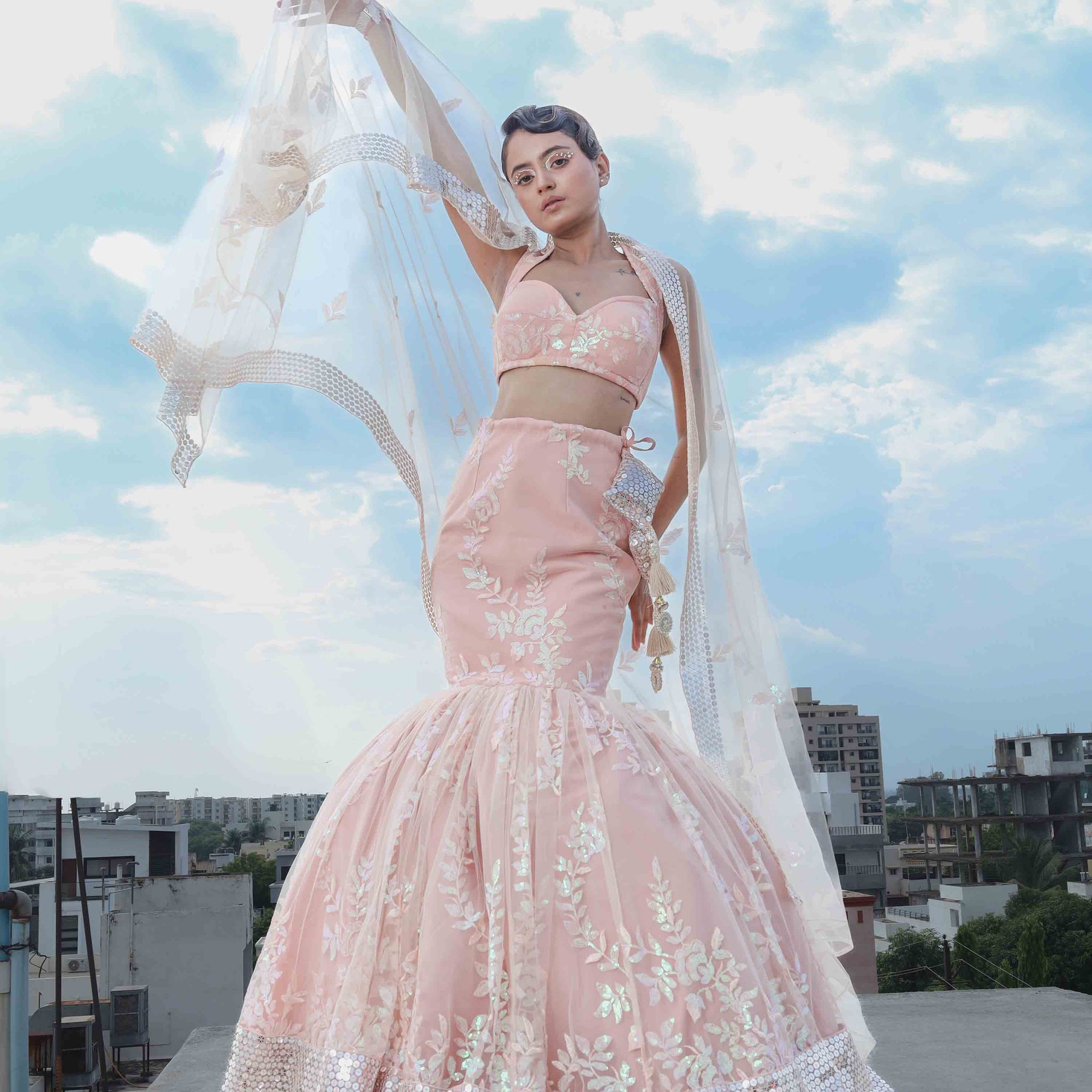 THE ENCHANTING PEACHY MERMAID LEHENGA WITH CORSET AND NET  DUPATTA