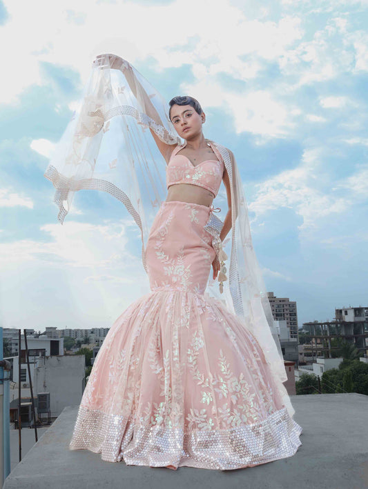 THE ENCHANTING PEACHY MERMAID LEHENGA WITH CORSET AND NET  DUPATTA