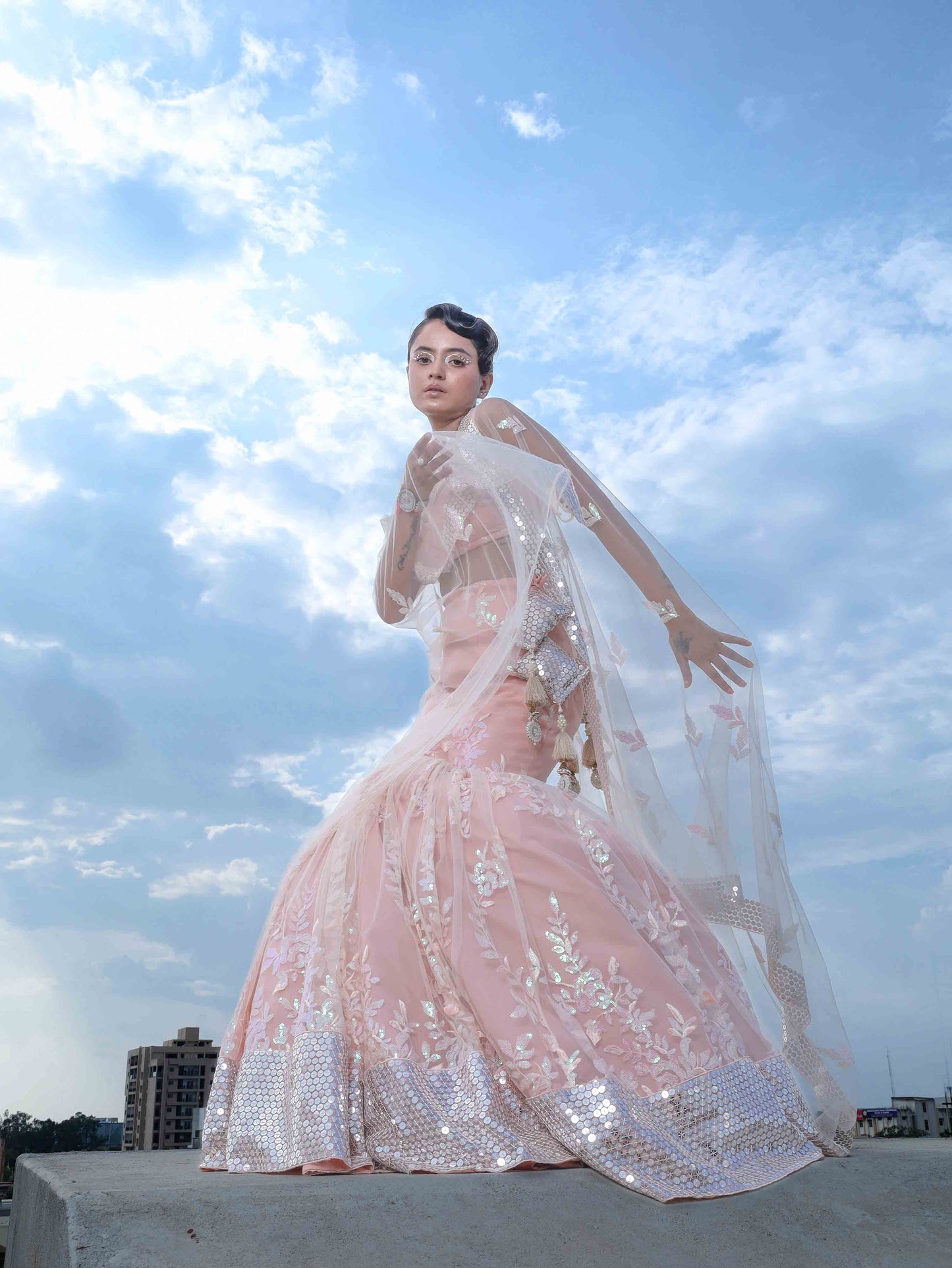 THE ENCHANTING PEACHY MERMAID LEHENGA WITH CORSET AND NET  DUPATTA